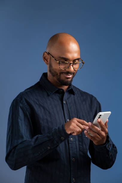 istock Businessman with smart phone 1422700366