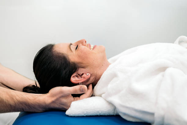 istock Woman Enjoying Neck Massage 1422700455