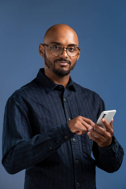 istock Businessman with smart phone 1422700456