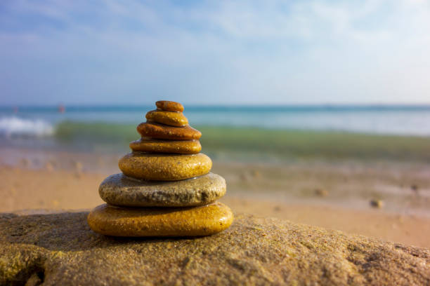 istock Stack of balanced stones on the beach 1422707506