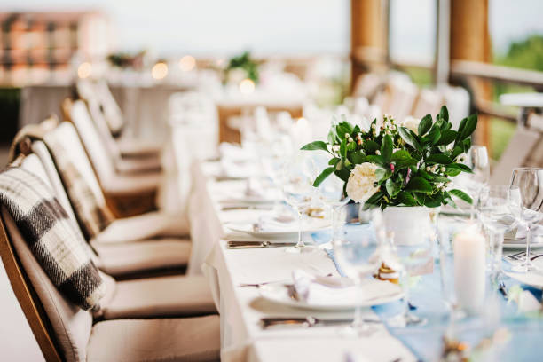 Fresh flowers wedding decoration. Table set up.