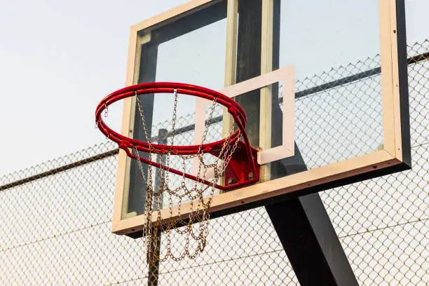 Photo of Close up shot of a basketball ring. Sports