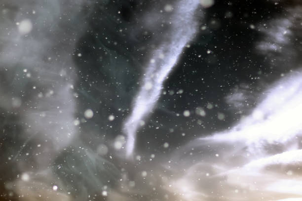 istock The snowfall in the sky with clouds, beautiful by nature. 1422727035