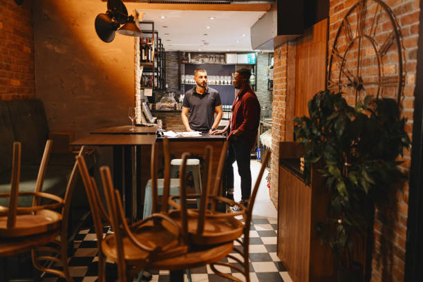 Small business and restaurant owners doing an audit, checking product inventory