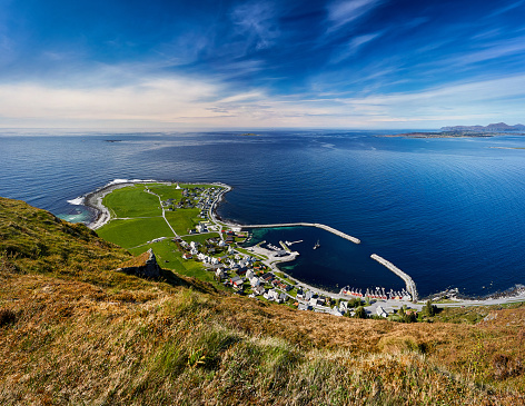 Views from the idyllic little fishing town of Alnes with its iconic lighthouse on the island of Godøy in Norway