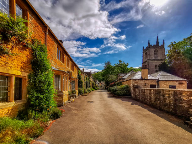 A sunny morning at the small idyllic village of Castle Combe in Wilsthire, UK.