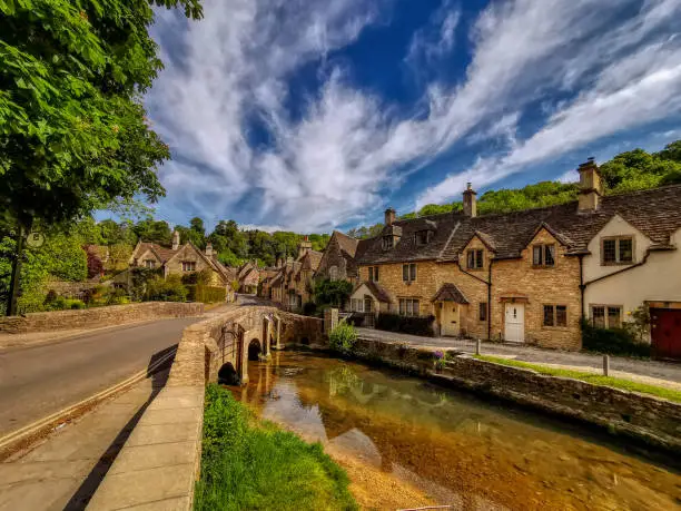 A sunny morning at the small idyllic village of Castle Combe in Wilsthire, UK.
