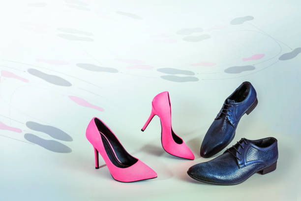 istock Pink high heels and black men shoes dancing on a gray floor with basic step pattern, ballroom dance concept, copy space 1422735693