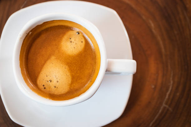 istock Hot coffee cup on wooden table 1422735995