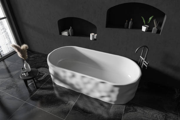 istock Top view of grey bathroom interior with bathtub and accessories 1422736100