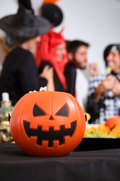 istock Pumpkin at a Halloween party. 1422742653