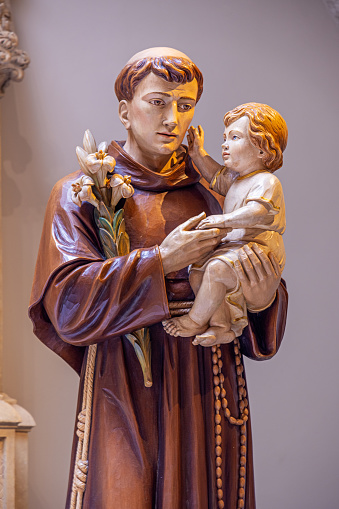 St. Patrick's Cathedral, Manhattan, New York, NY, USA - July 12th 2022:  Statue of Saint Anthony and the Jesus child