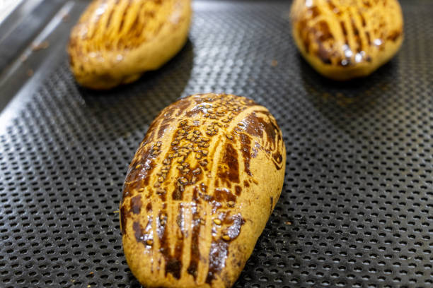 istock Hot and fresh pastry in a tray. Turkish name: Pogaca 1422743699