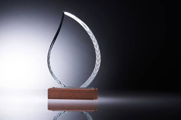 istock Crystal or glass trophy against gray background 1422744852
