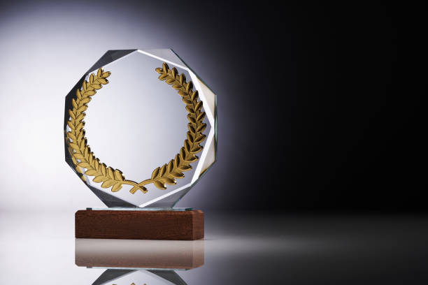istock Crystal or glass trophy against gray background 1422744929