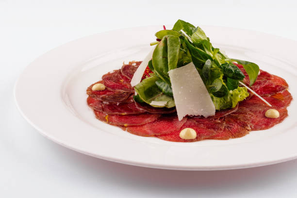 istock Beef carpaccio with parmesan cheese close up 1422745715