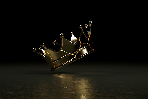 3d rendering of cracked queen's crown, black background.