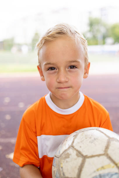 Lifestyle children training and playing soccer