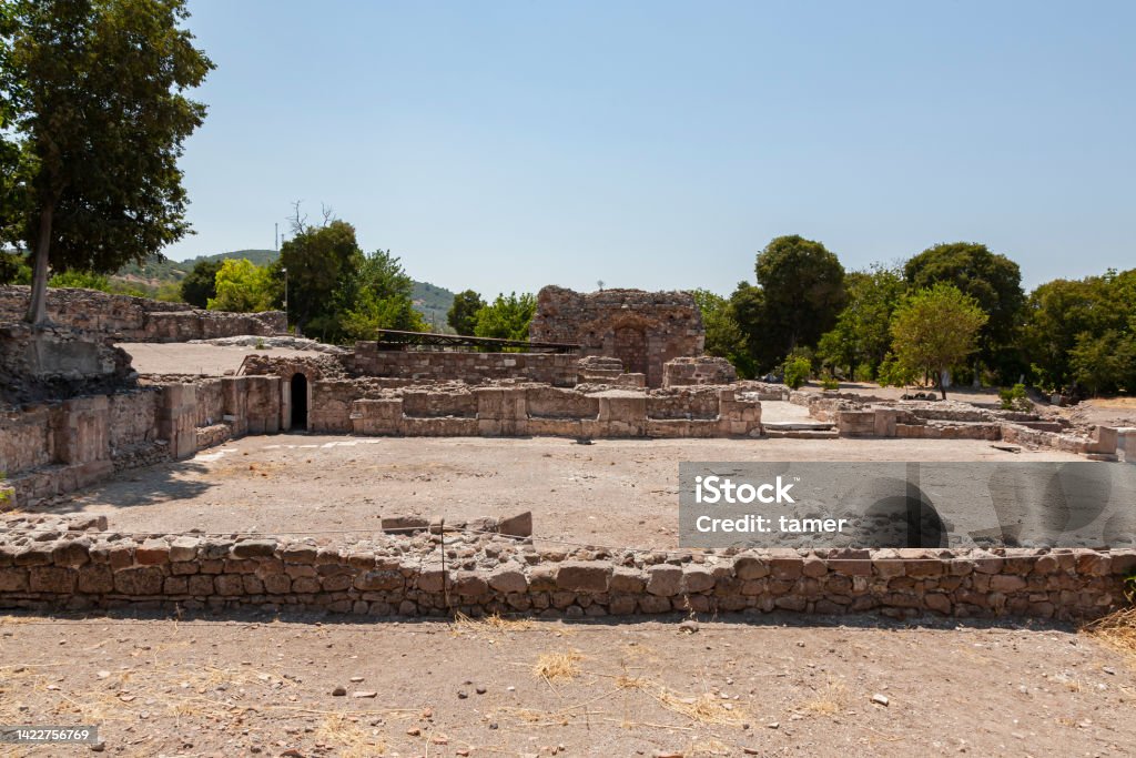 Ruins of the sanctuary of Apollon Smintheus known also as Smytntheion in the town of Ayvacik, Canakkale, Turkey Ruins of the sanctuary of Apollon Smintheus in Ayvacik, Turkey, which comes from the word sminthos meaning mice as Apollo killed the mice damaging the agriculture. Agricultural Field Stock Photo