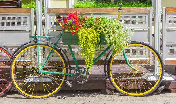 istock Colorful green bicycle decorated with flowers in Plock 1422762053