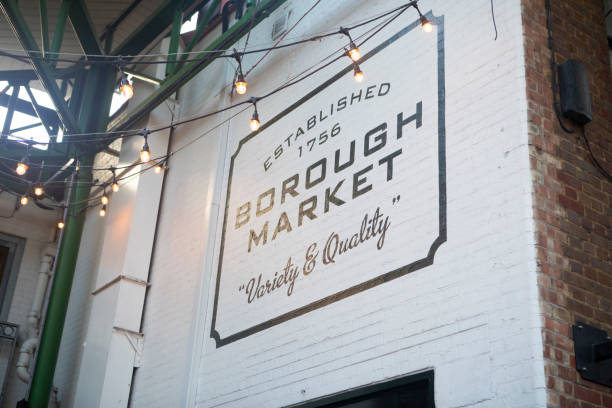 Sign inside Borough Market Borough Market, London, at the start of the day in summer borough market stock pictures, royalty-free photos & images