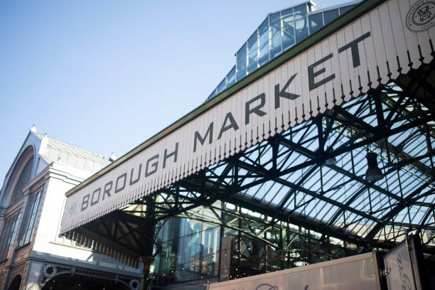 Sign outside Borough Market Borough Market, London, at the start of the day in summer borough market stock pictures, royalty-free photos & images