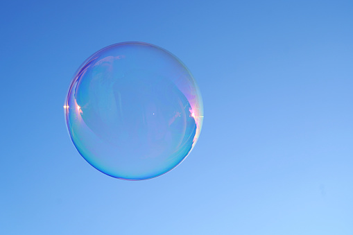 Bubble on blue background .