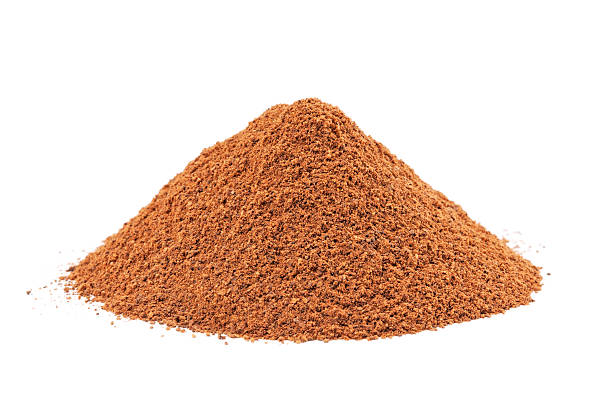 istock Heap of ground Cinnamon isolated on white background. 142276454