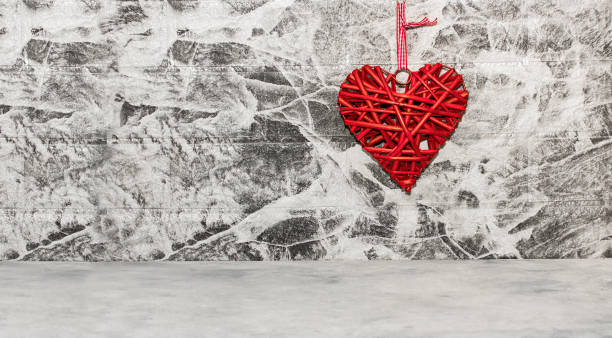 istock Rattan work of heart shape on grey background wall 1422766581