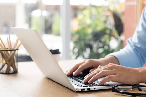 istock businessman working on laptop typing chat, work contact, investor idea plan, internet search, people connection concept. 1422767790
