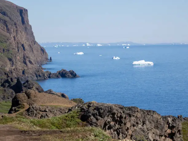 Photo of Gorgeous landscapes along the Kuannit Hiking trail in Qeqertarsuaq, Disko Island, Western Greenland. Whales can often be seen near the shores