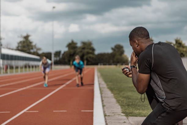 istock Two athletic children working hard on the running track 1422770777