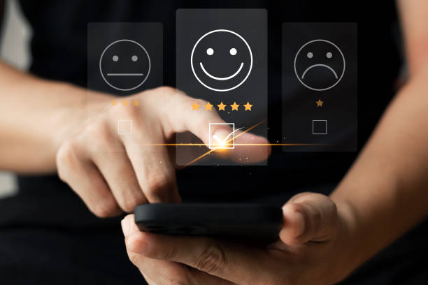 istock User give rating to service experience on online application, Customer review satisfaction feedback survey concept, Customer can evaluate quality of service leading to reputation ranking of business. 1422770977