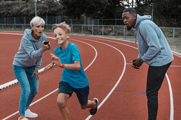 istock Athletics mother running coach working with her children during a training session 1422771046