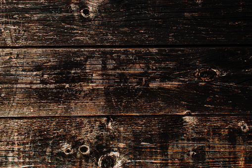 Old wooden planks brown and black background