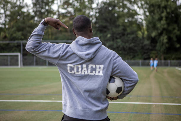 Handsome black soccer football coach
