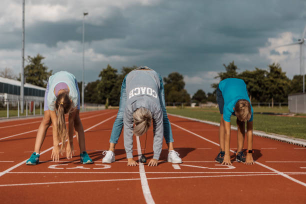 istock Athletics mother running coach with her children during a training session 1422771718