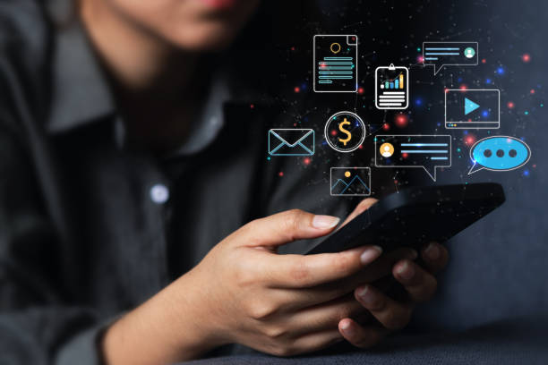 istock the businesswoman is working on a smartphone to use search engine optimization tools. To find customers or promote and advertise online content for technology, marketing, and business ideas. 1422775197