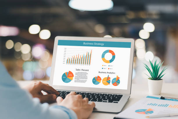 istock accounting concept. businessman working using a laptop with analyzing finance sales data and economic growth graph chart. 1422775261