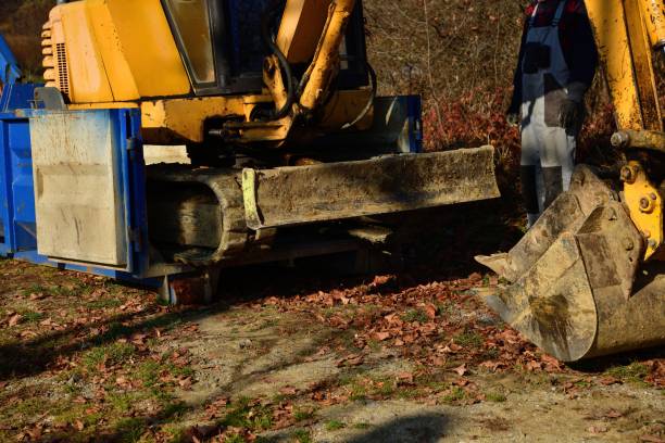 istock A tow truck transports a broken down excavator 1422776725