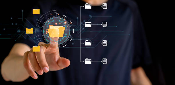 istock Document management system and IT business processes arranging for archiving Find and manage files and corporate data. Digital transformation of files. 1422777401