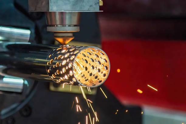 The fiber laser cutting machine cutting machine cut the stainless steel tube. The fiber laser cutting machine cutting machine cut the stainless steel tube. The hi-technology sheet metal manufacturing process by laser cutting machine. laser cutting metal stock pictures, royalty-free photos & images