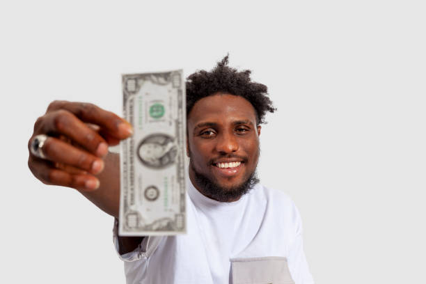 Portrait of adult men holding money stock photo