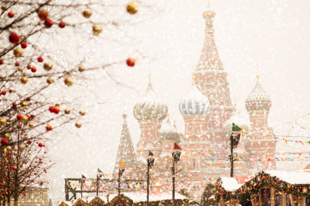 istock christmas bazaar in Moscow,winter fair on red square with snow 1422785104
