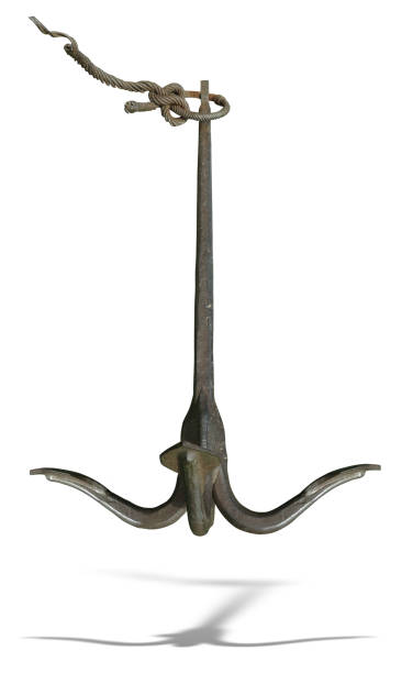 istock Iron black old rusty naval anchor isolated over white background 1422795618