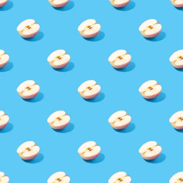 Seamless summer background with halves of apples - absolutely seamless pattern