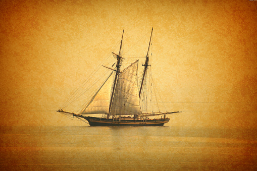 Weathered, antique photograph of tall ship