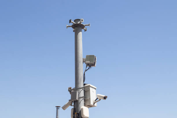 istock Outdoor surveillance cameras. Security cameras on a pole 1422805435