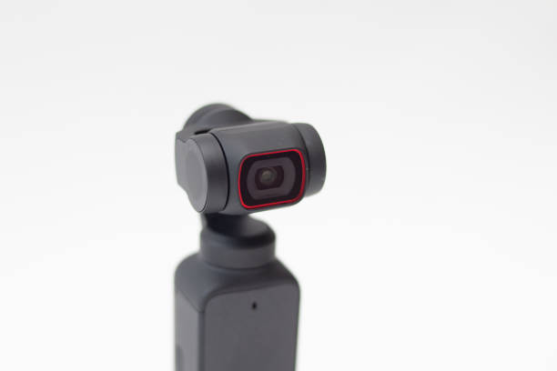 istock Action Camera video gimbal stabilizator on white background. 1422809117