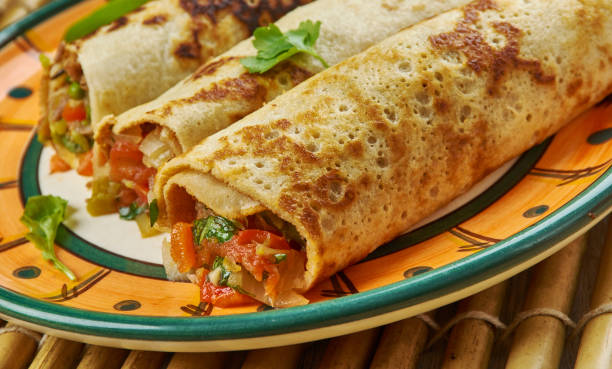 istock Street Style Veg Schezwan Aloo Frankie Roll 1422809771
